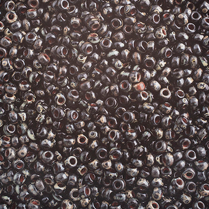 Perlas de semillas Miyuki 11/0 Picasso negro opaco, bolsa de 22 g